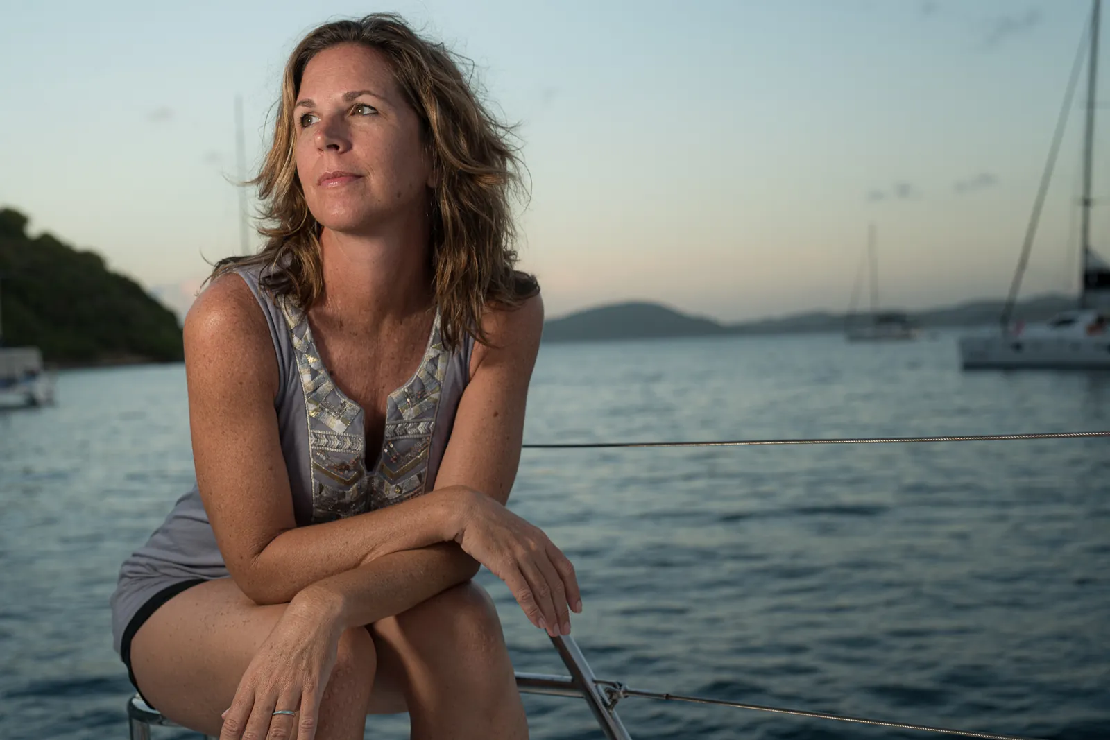 Jill Futrell on a boat at sunset