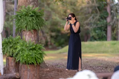 Jill Futrell photographing a wedding ceremony