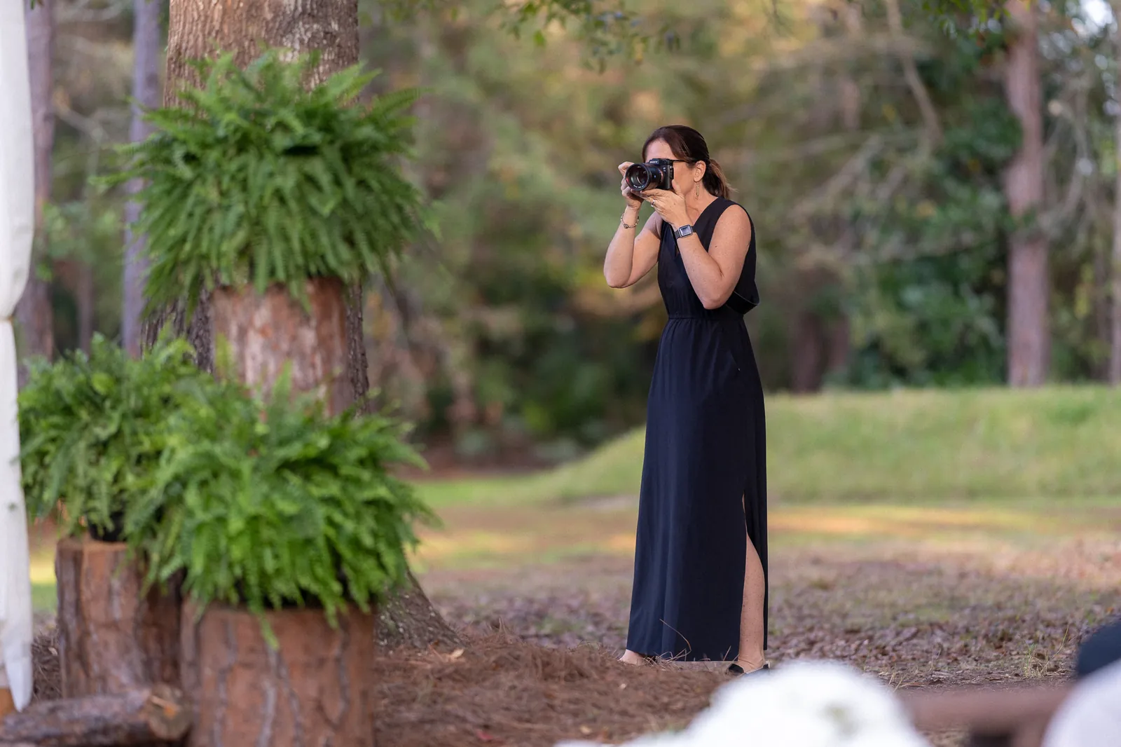 Jill Futrell photographing a wedding ceremony