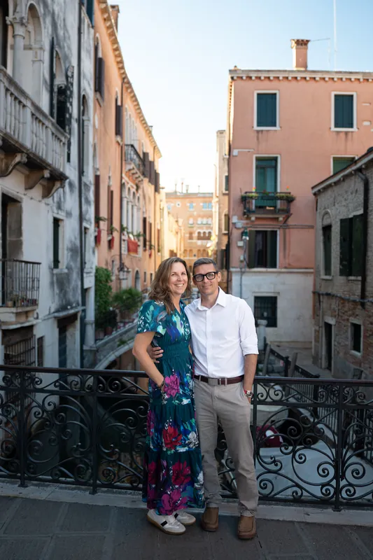 Rob and Jill Futrell on a bridge over a canal in Venice, Italy