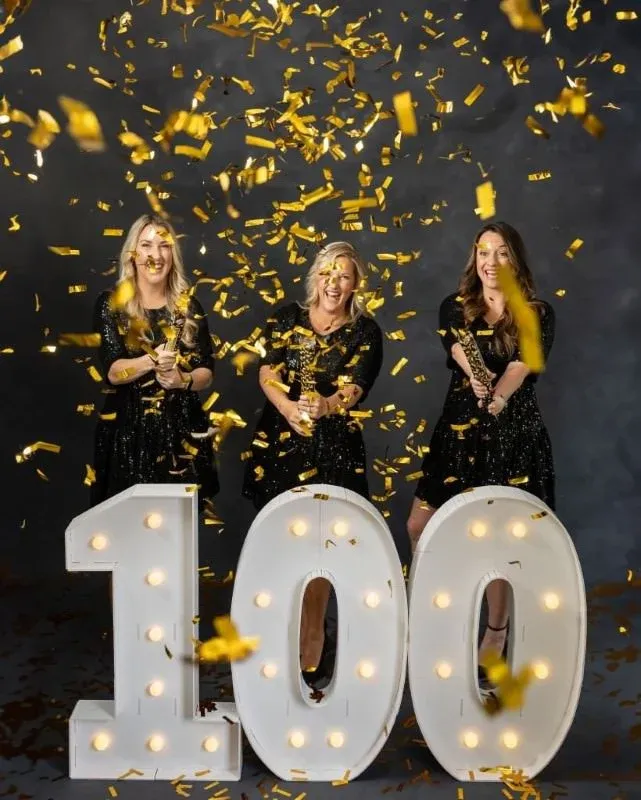 St Augustine business milestone celebration with confetti