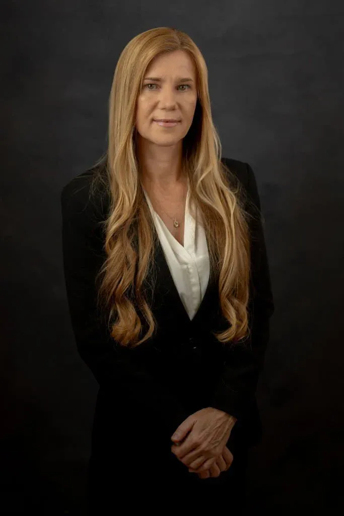 St Augustine corporate headshot executive woman in blazer
