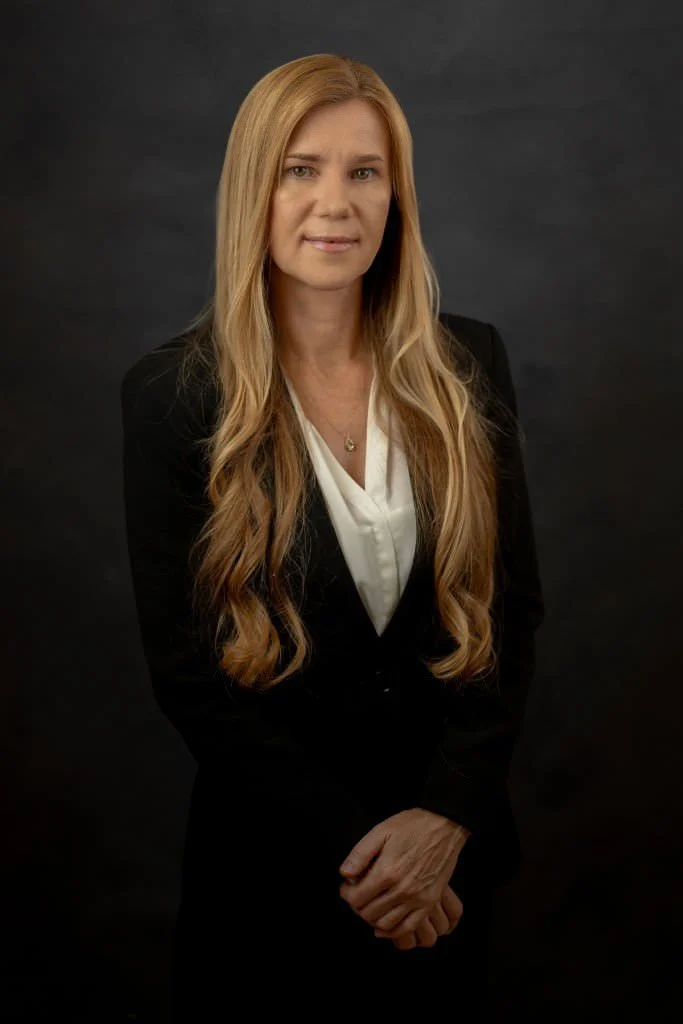 St Augustine corporate headshot executive woman in blazer