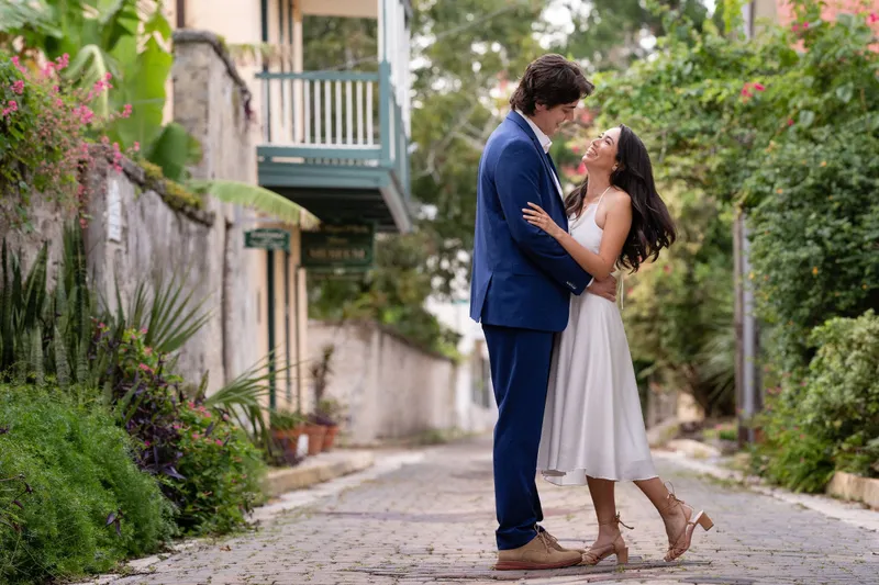 Couple on cobblestone Aviles Street during St Augustine elopement
