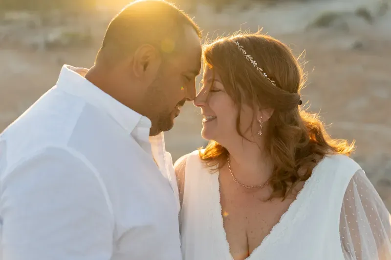 Intimate couple portrait on St Augustine beach at sunset