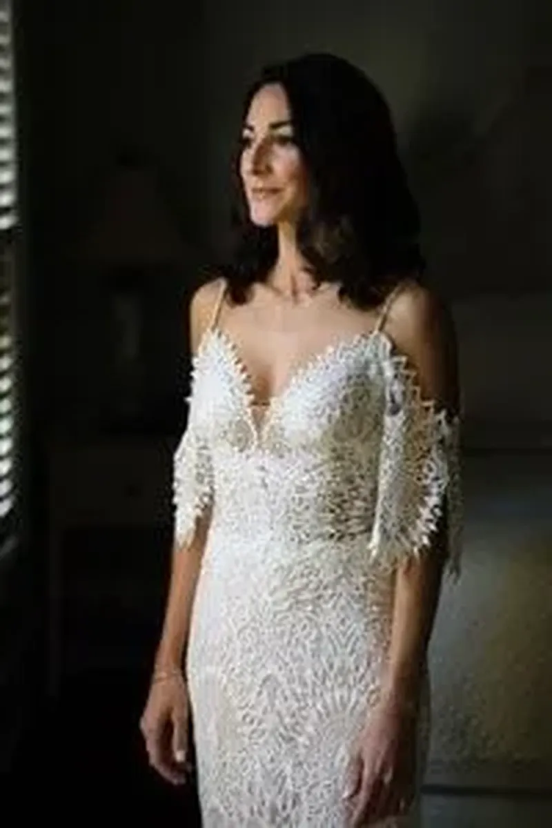 Bridal portrait in lace wedding dress with natural window light