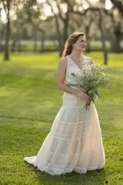 Bride with bouquet surrounded by nature in St Augustine