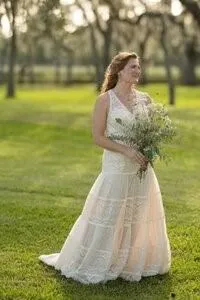 Bride with bouquet surrounded by nature in St Augustine