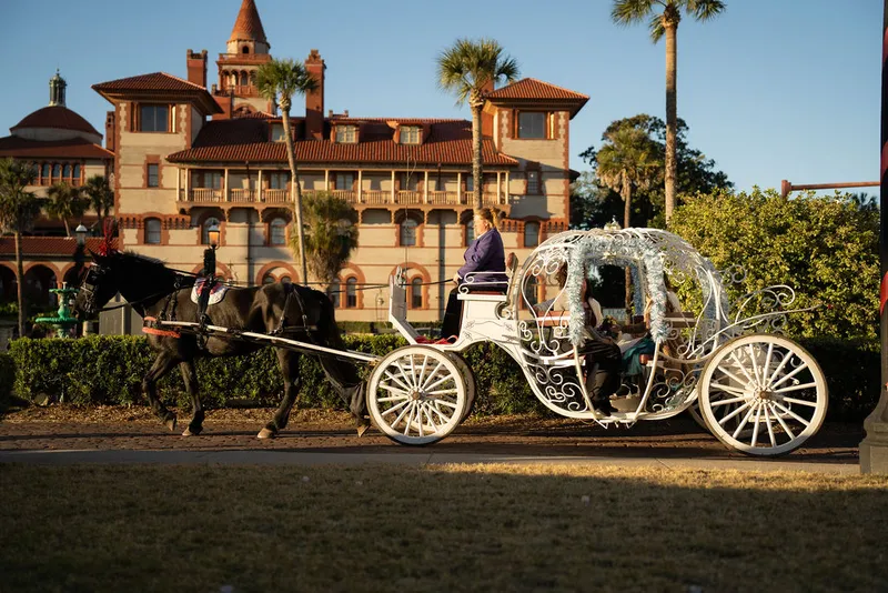 Couple in Cinderella carriage at Flagler College