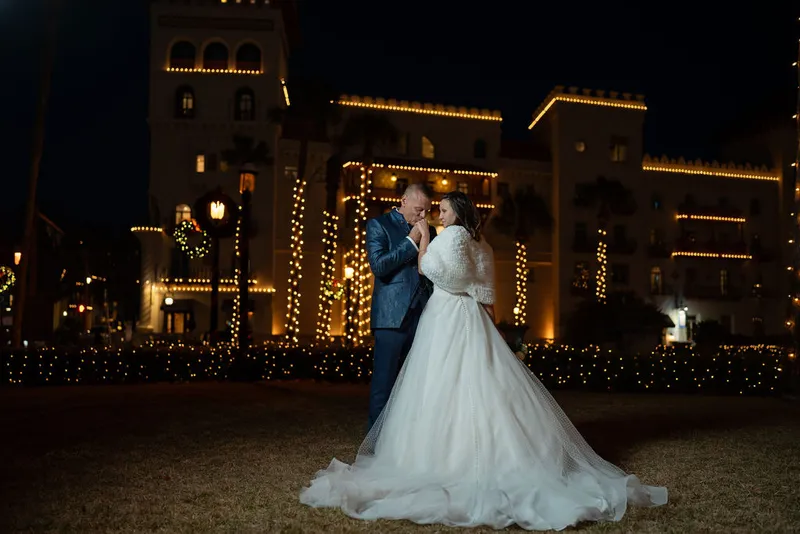 Couple portrait at Casa Monica during Nights of Lights
