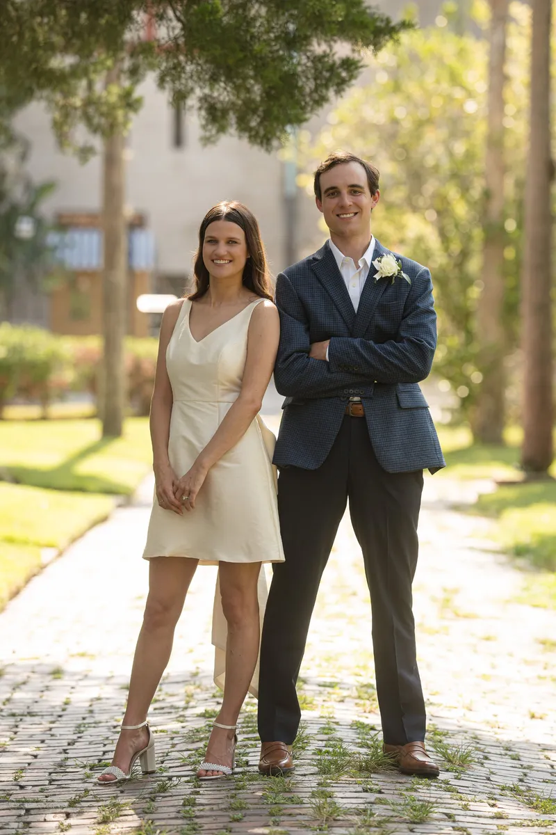 Couple poses in front of historic landmarks during St Augustine elopement