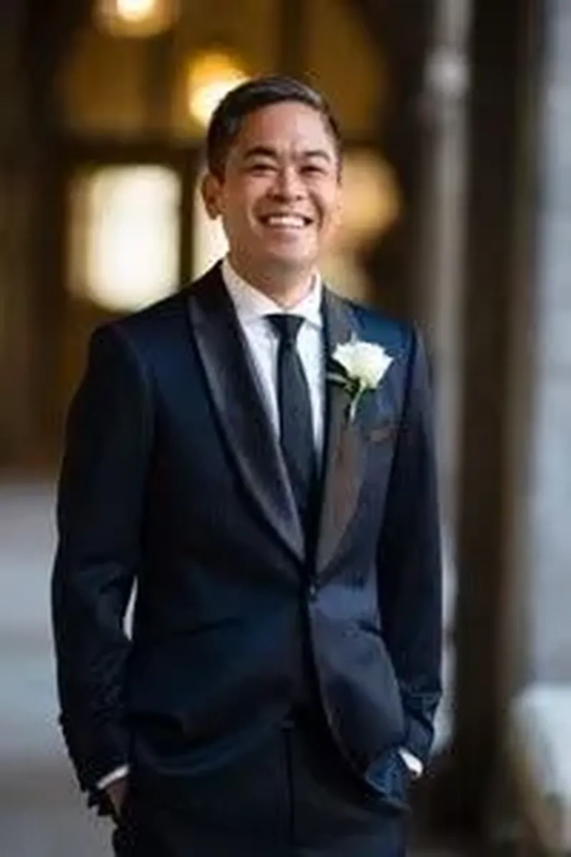 Groom portrait smiling with boutonniere at St Augustine elopement