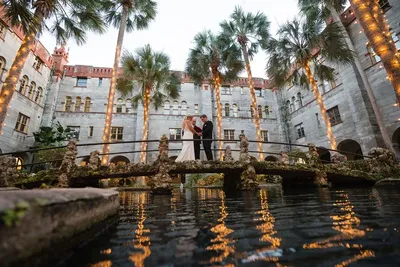 Lightner Museum wedding couple on bridge at dusk