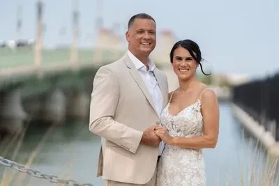 Couple portrait at St Augustine marina with Bridge of Lions