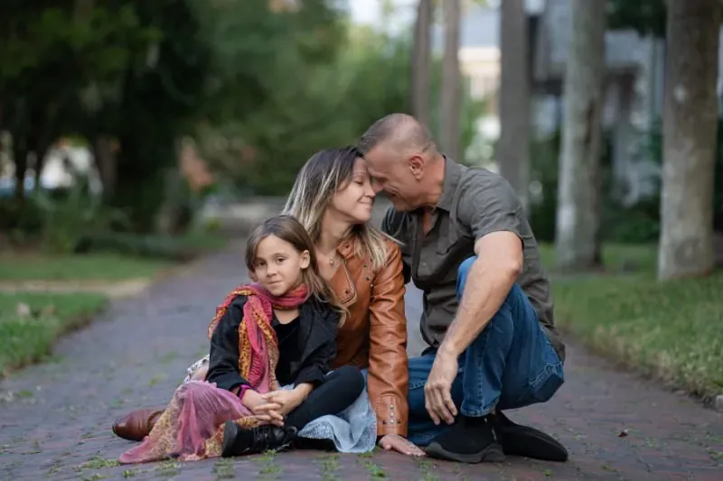 Candid family moment with daughter smirking