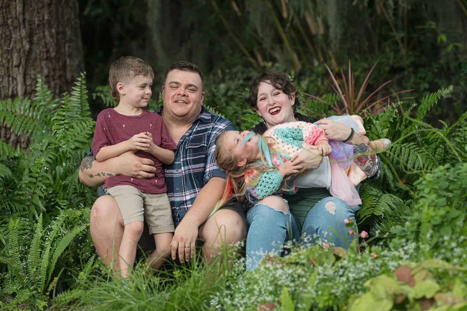 Family walking along the beach at sunset in Florida