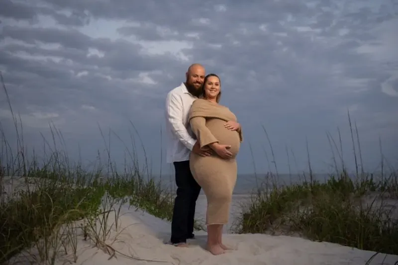 Couple portrait on the beach at sunset