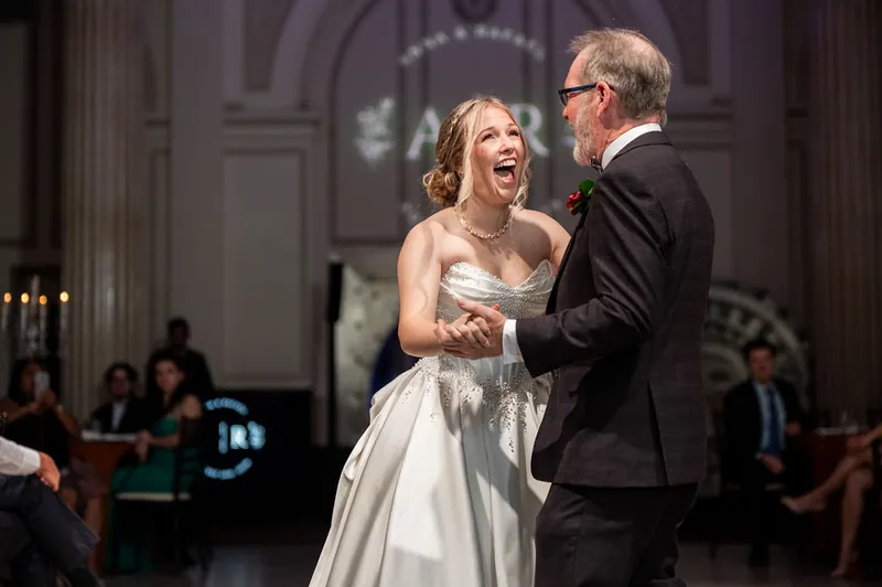 Anna and Rafael dance together at The Treasury on the Plaza during their St. Augustine reception.