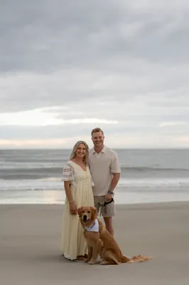Couple with dog on beach, St. Augustine engagement photographer session