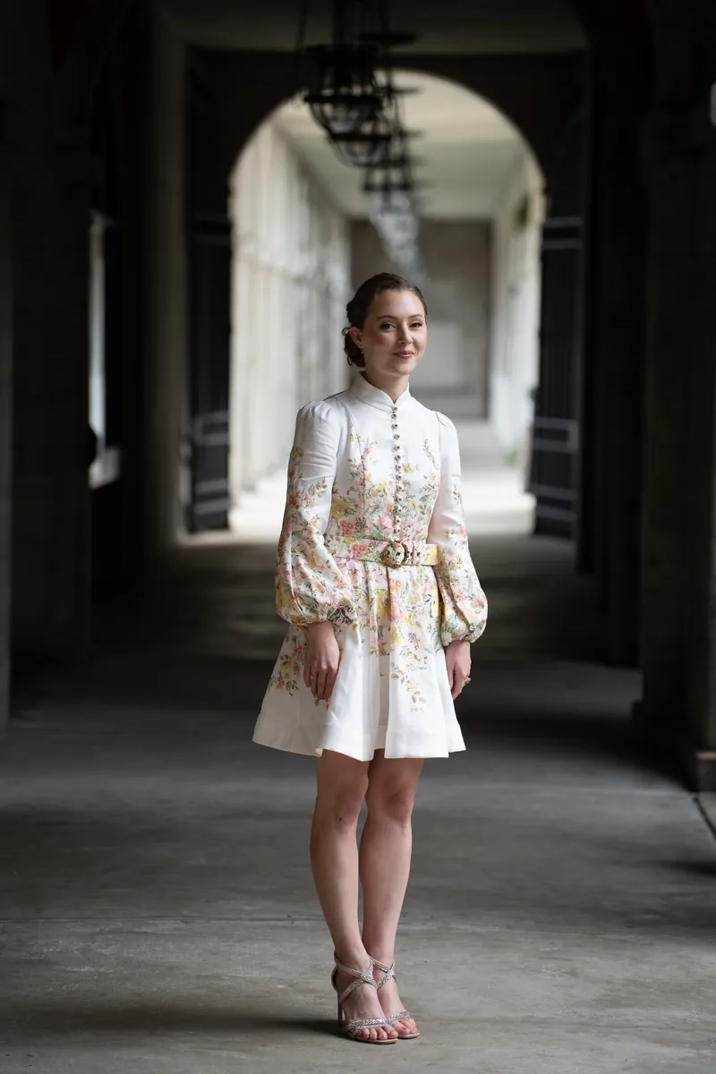 Bride arriving at chapel in floral embroidered dress