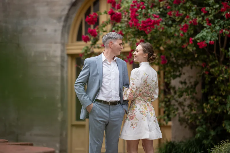 Walking through covered corridor after ceremony