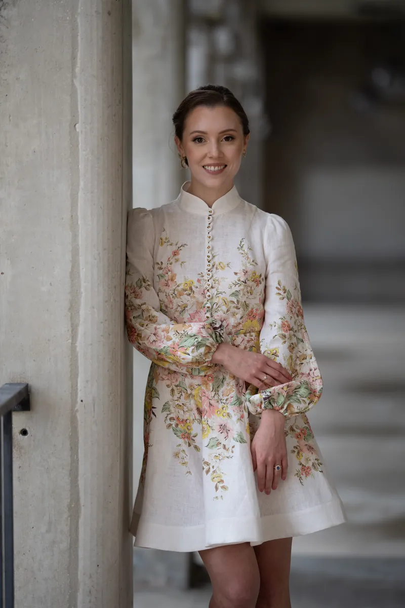 Bride portrait showing floral embroidered dress detail