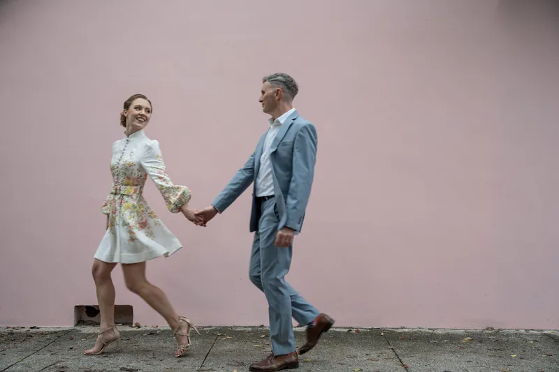 Silhouette of couple in museum archway