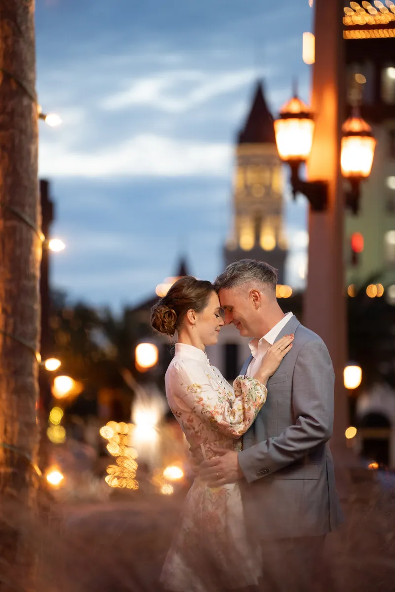 Evening portrait with streetlamps and church tower