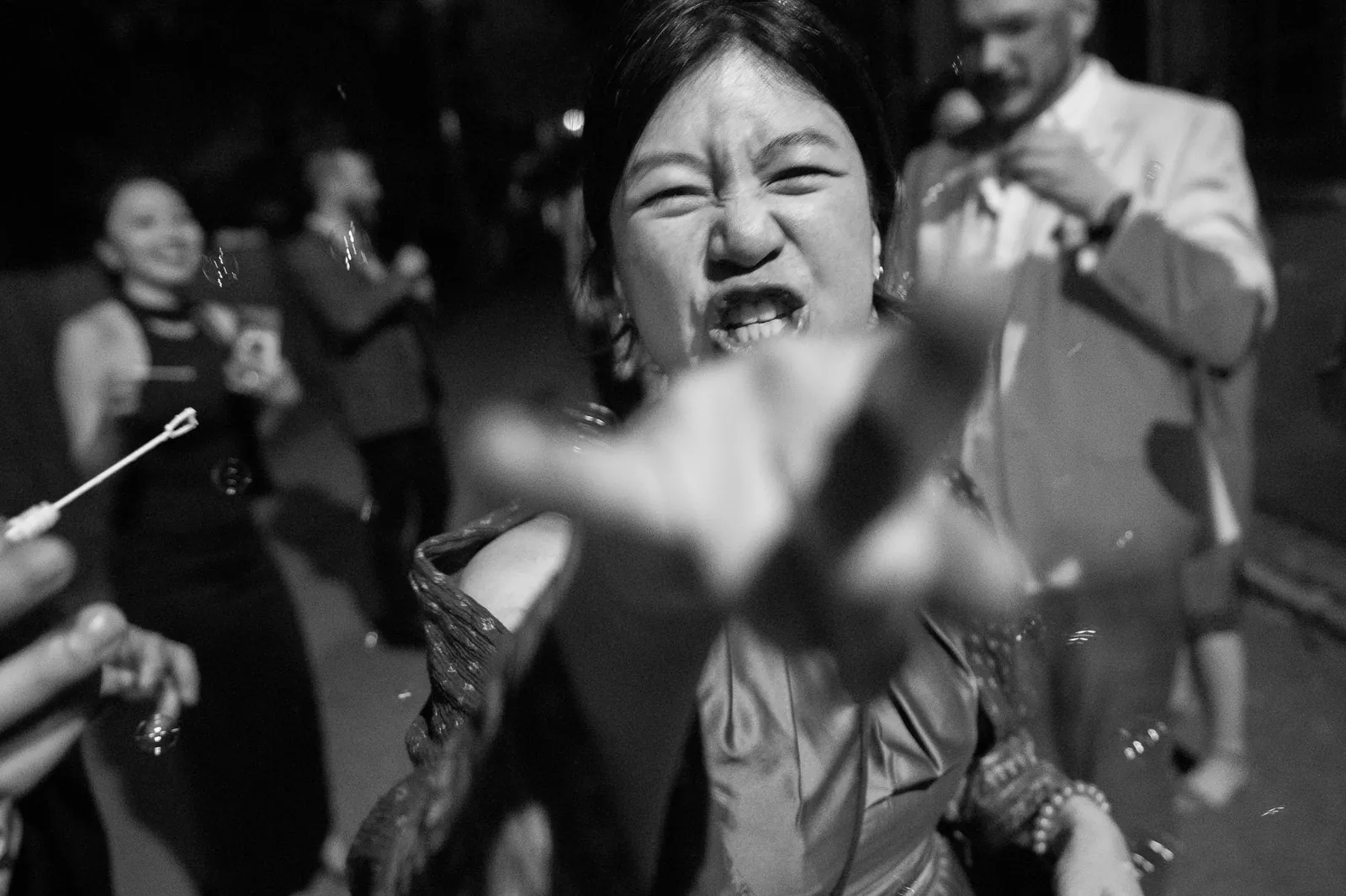 Bride Binh dancing at reception black and white at the Oldest House