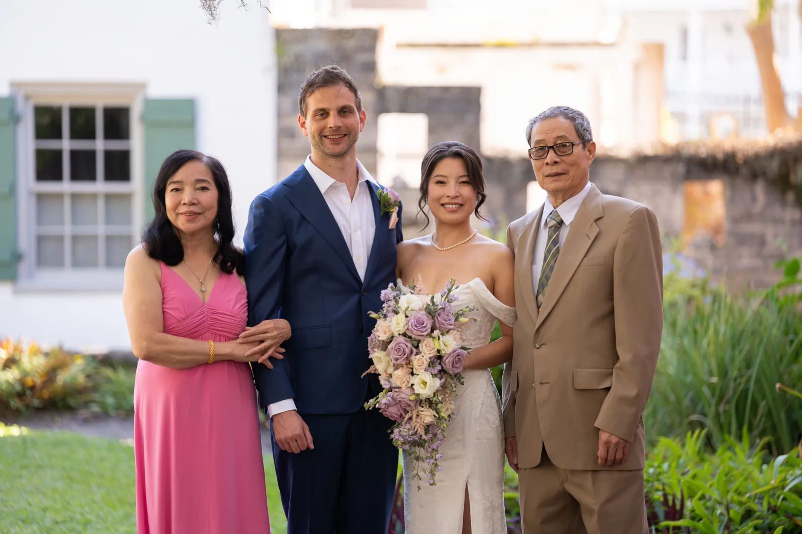 Binh and Nico with bride's parents at the Oldest House
