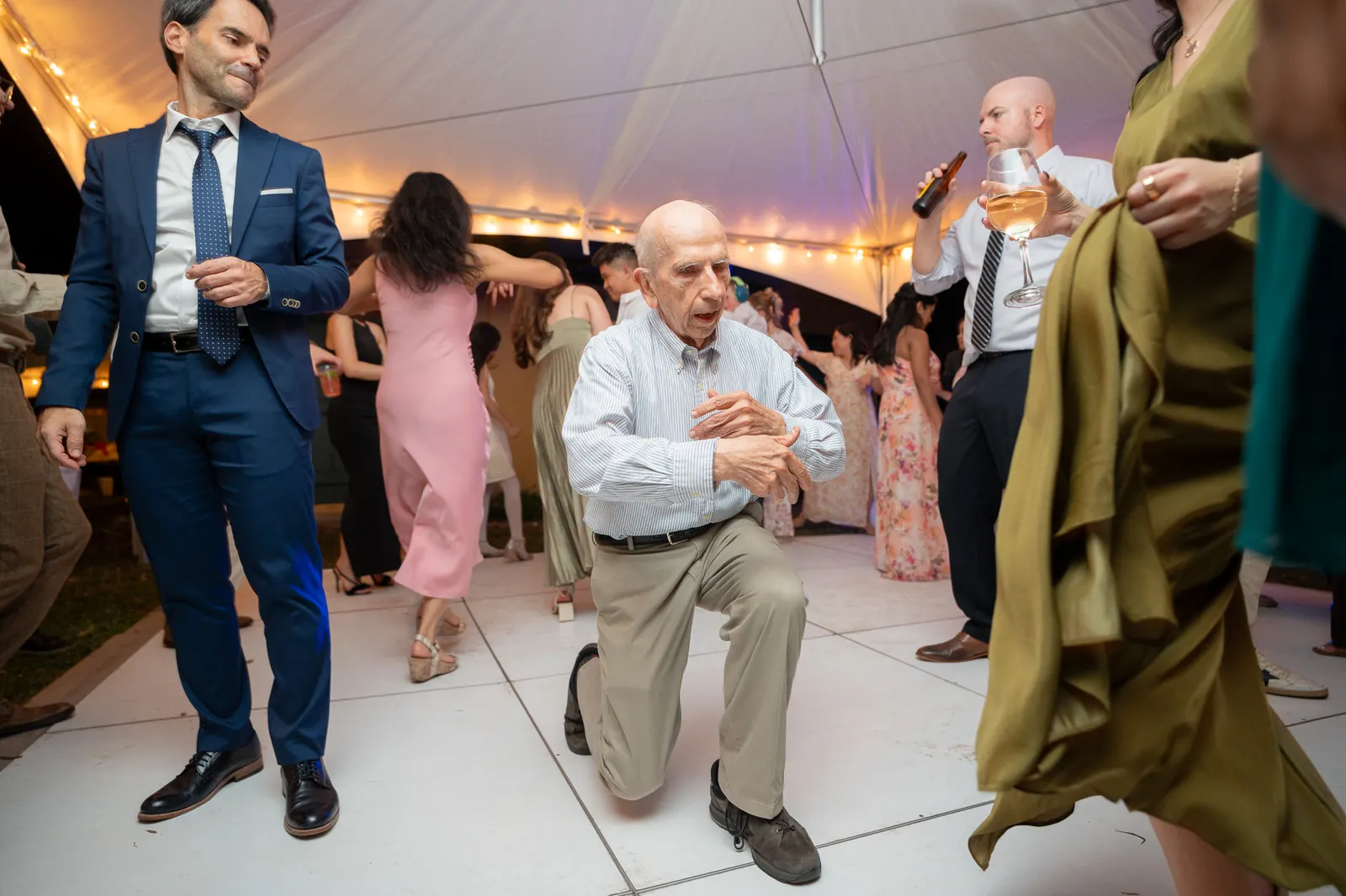 Grandfather dancing at reception at the Oldest House wedding
