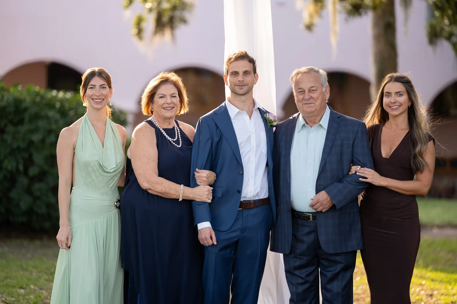 Groom Nico with his family at the Oldest House wedding