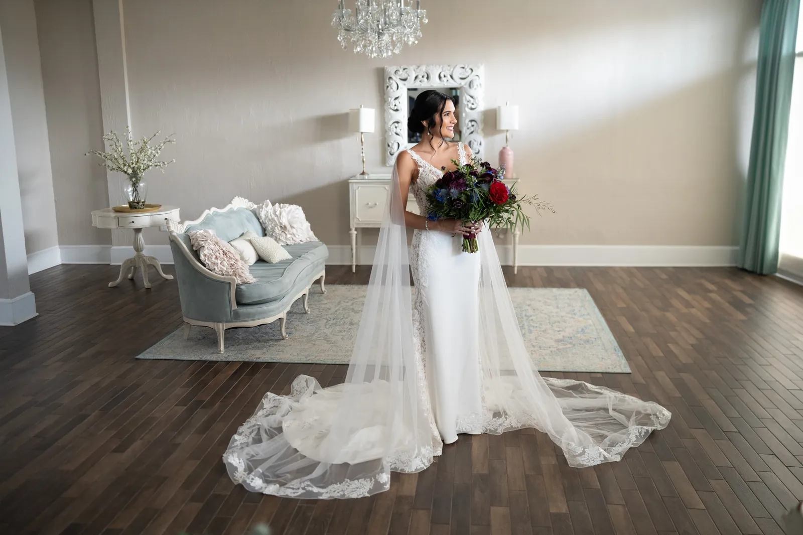Bride Bri full length portrait with veil and bouquet in bridal suite at The White Room