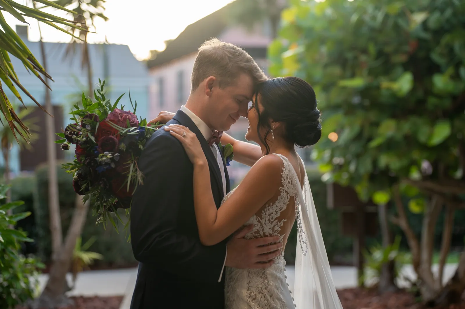 Bri and Nick intimate portrait foreheads touching at golden hour