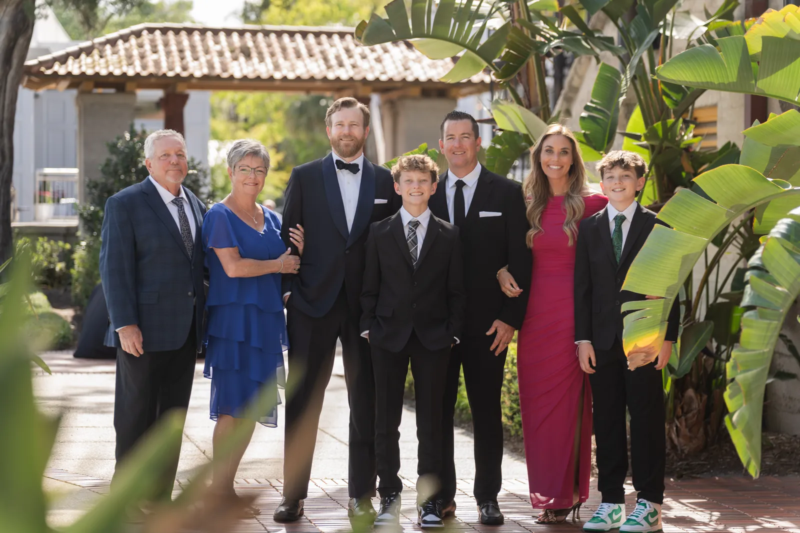 Groom with family in Lightner Museum courtyard