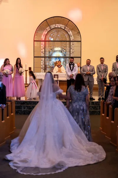 Bride walking down the aisle at St. Anastasia Catholic Church in St. Augustine
