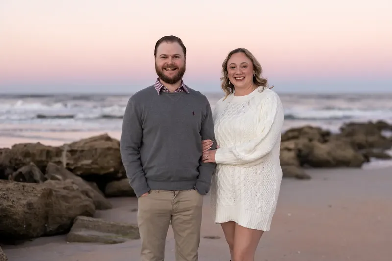 Carli and Jeff portrait at the coquina rock beach at Washington Oaks during dusk