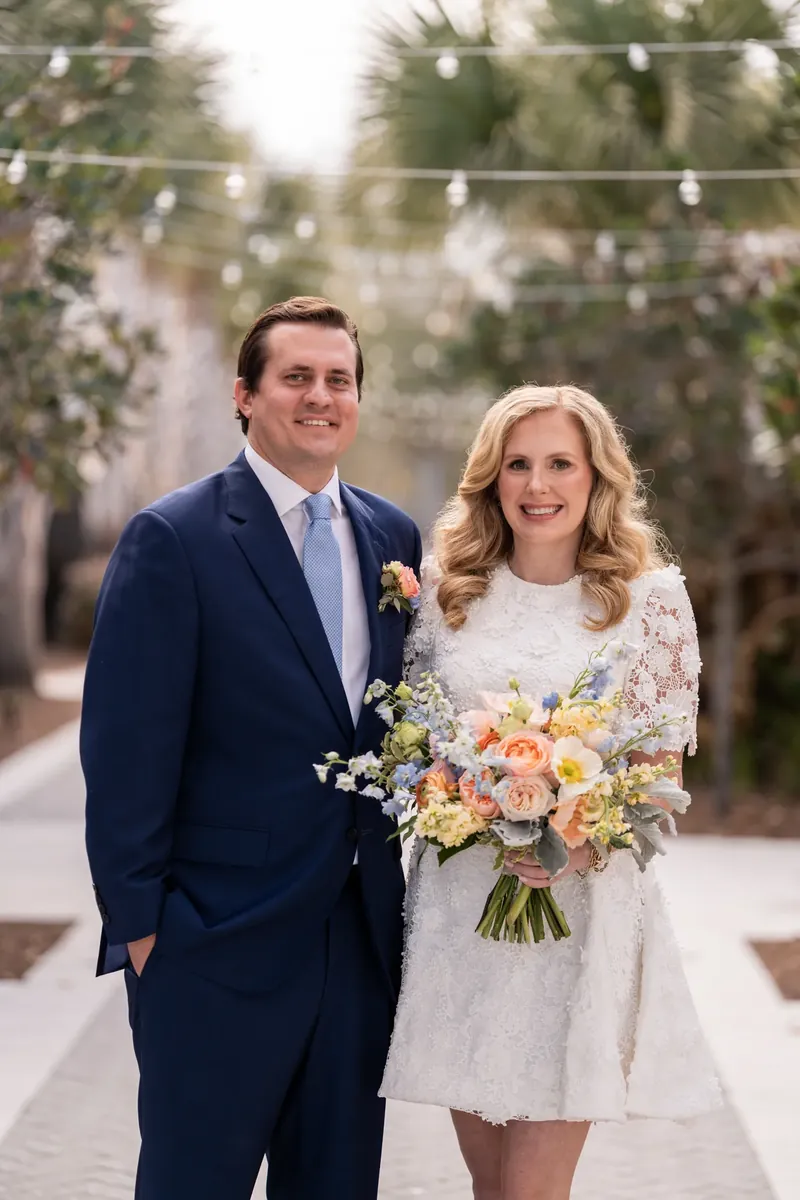 Chauncey and James portrait together under string lights