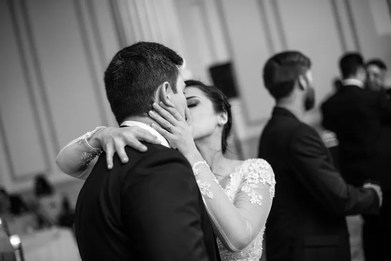 Choko kisses Michael during their first dance at The Treasury on the Plaza, St. Augustine.