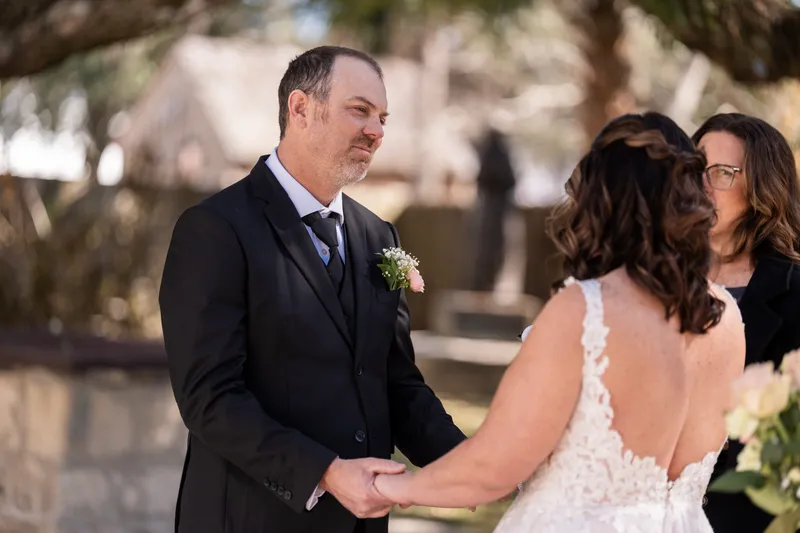 Donnie looking at Jennifer during the ceremony vows