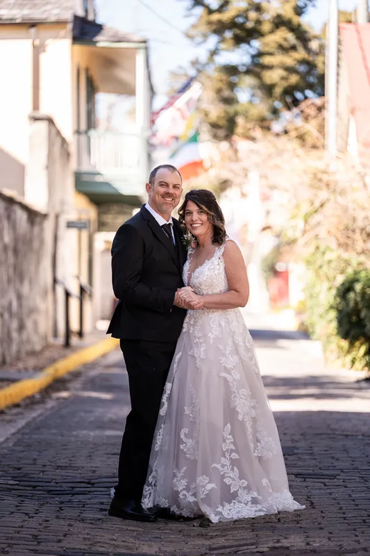 Donnie and Jennifer standing together on a cobblestone street in downtown St. Augustine