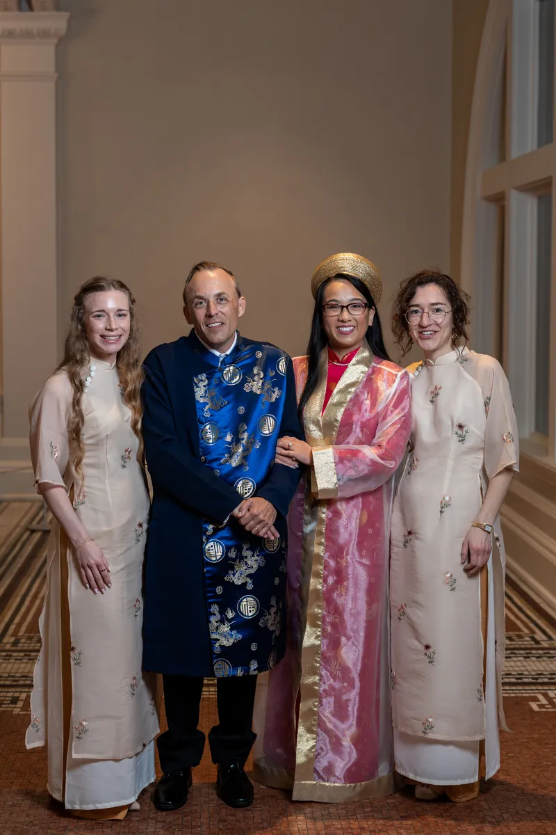 Wedding party in Vietnamese ao dai at the Lightner Museum — Elizabeth in pink and gold, Jason in blue silk