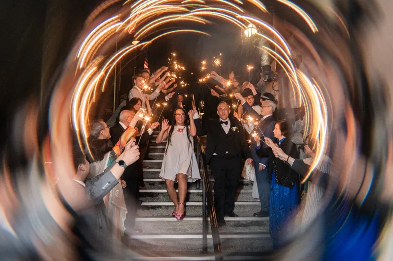 Sparkler exit down the steps of Lightner Museum with swirling light-trail ring shot