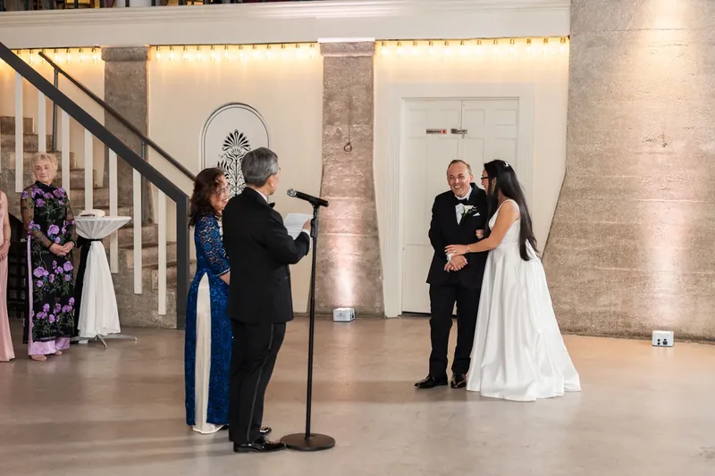 Jason and Elizabeth share a kiss during their reception at the Lightner Museum, St. Augustine.