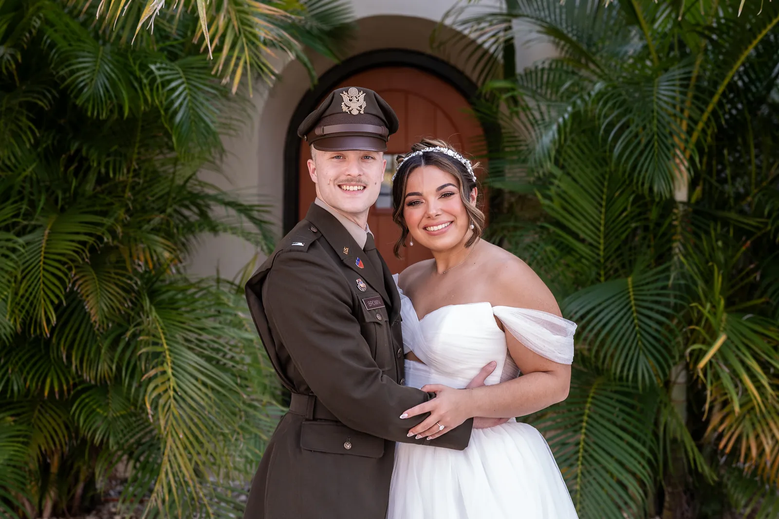 Bride with bridesmaids in sage green dresses at The Treasury