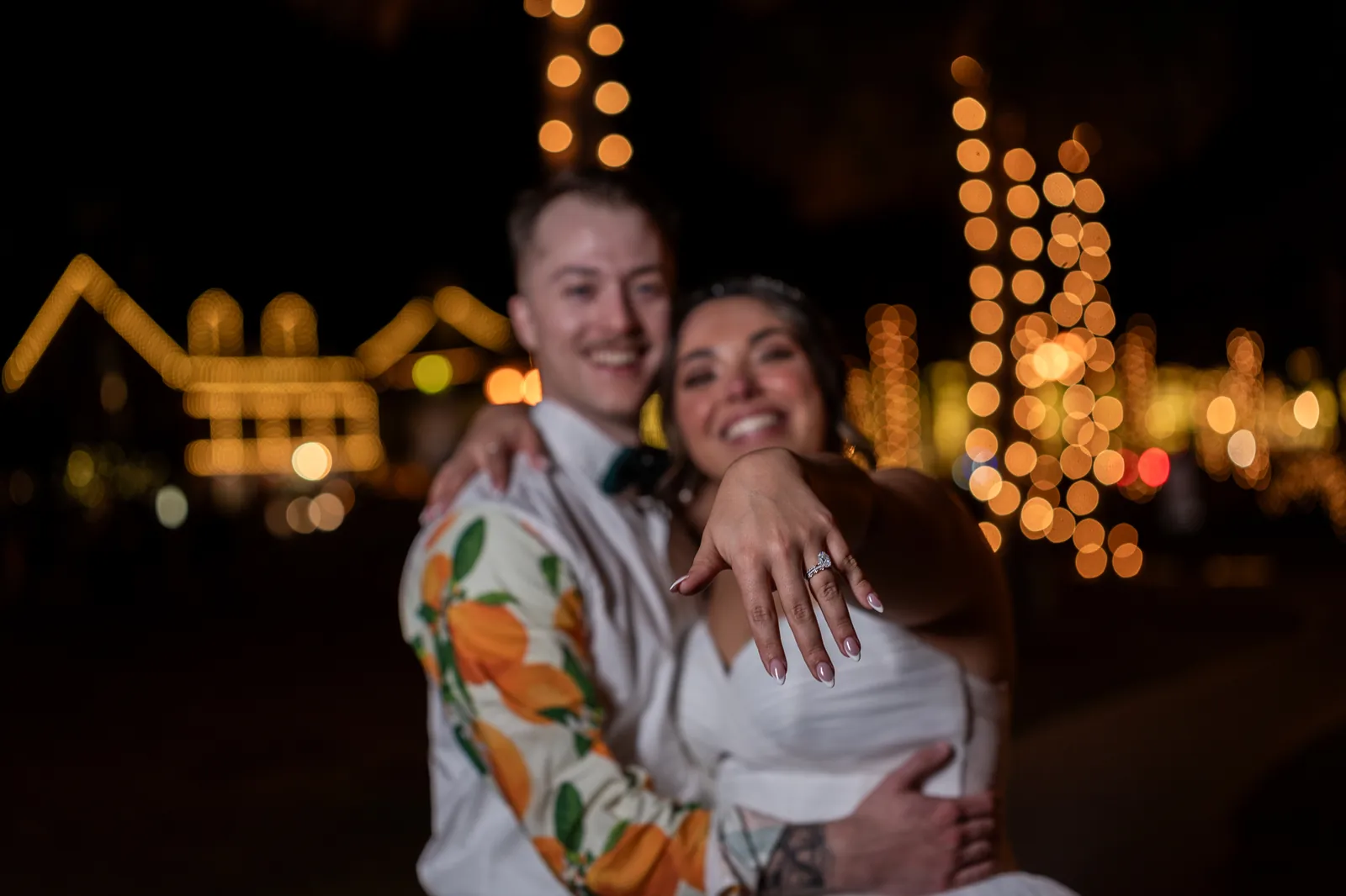 Sparkler exit with Nights of Lights in background