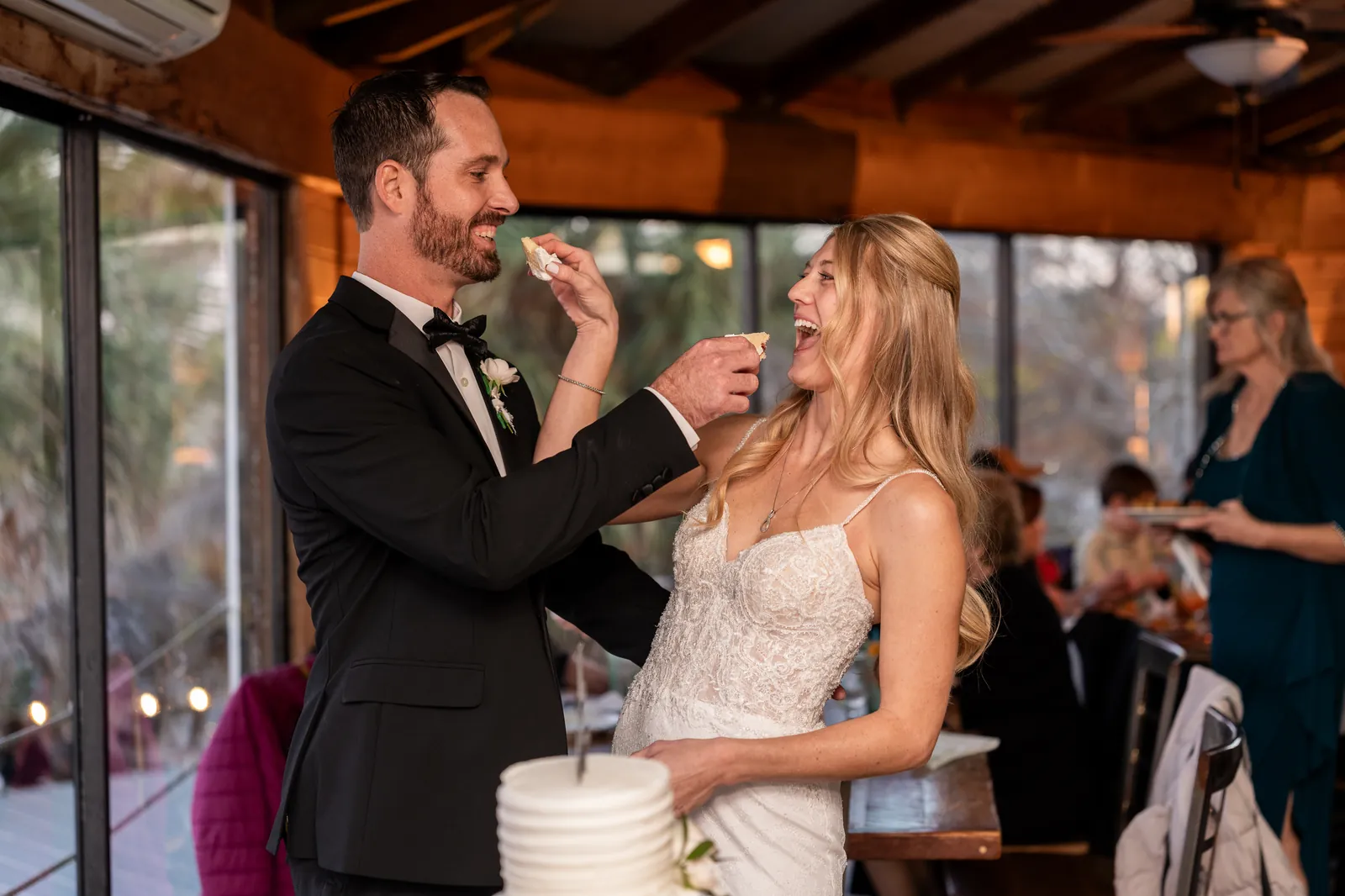 Cake cutting at Conch House wedding reception