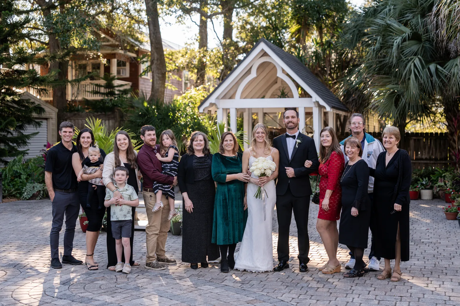 Newlyweds in courtyard after St Augustine wedding ceremony