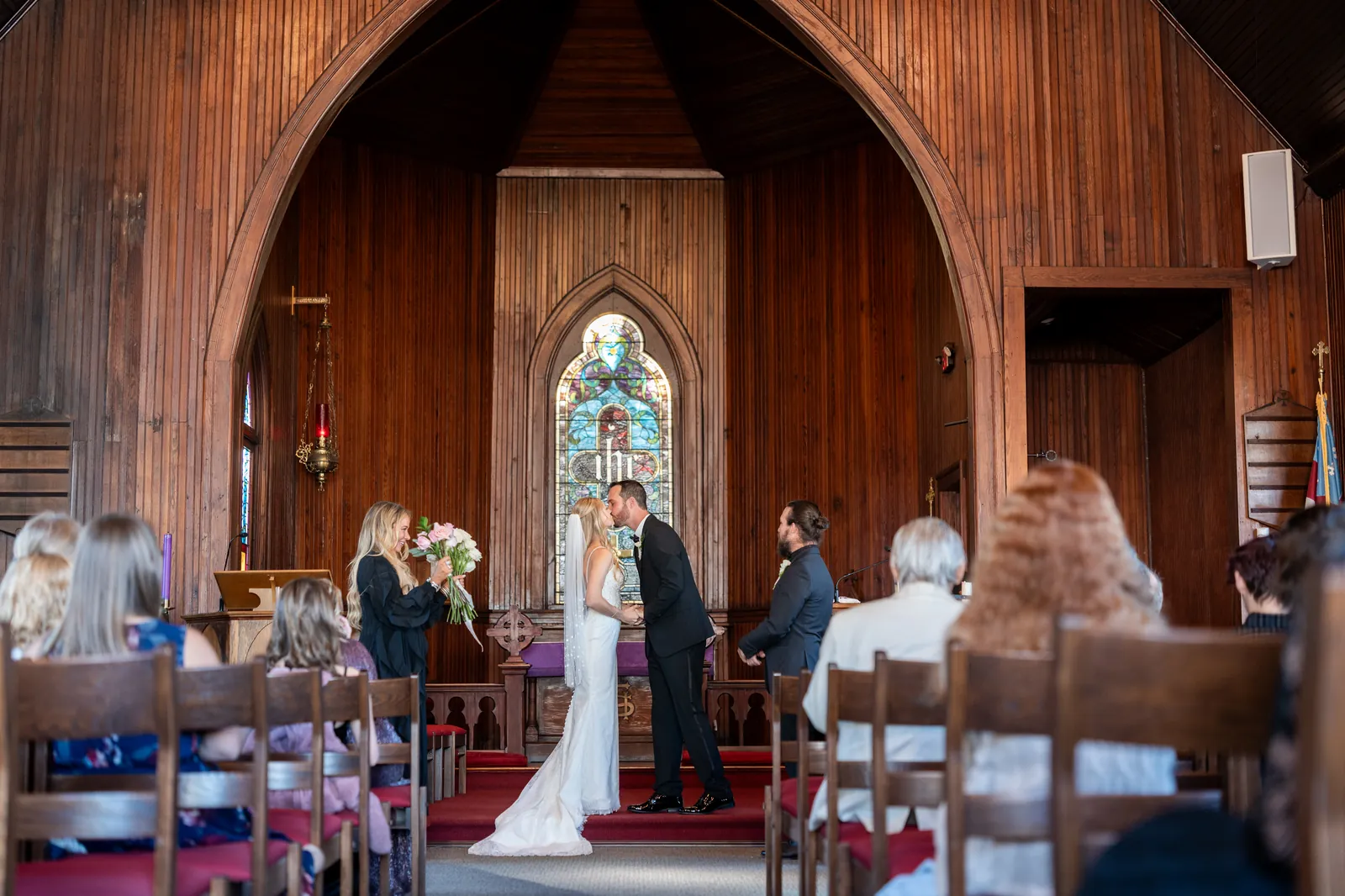 First kiss at St Cyprians Church wedding ceremony