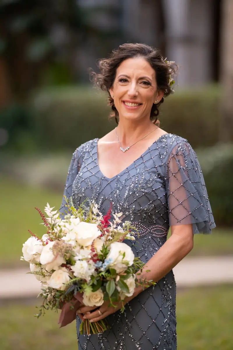 Bride portrait with bouquet in the courtyard